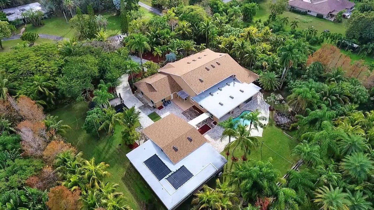An aerial survey of a rooftop and structure, captured from a commercial drone, the kind of record that would otherwise require sending a person up a ladder.